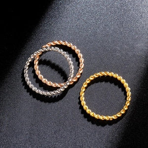 Twisted rope design minimalist rings in silver, gold, and rose gold finishes