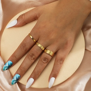 Three-piece set of golden minimalist C-shaped open rings for women in a luxury style