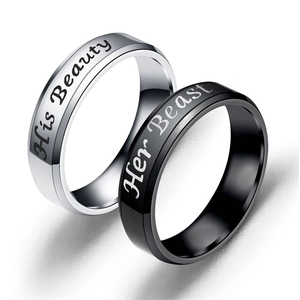 Polished stainless steel couple rings with Her Beast and His Beauty script engraving