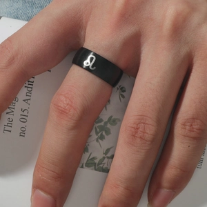 Black stainless steel Leo zodiac ring for men with silver engraving on a wide band