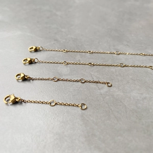 Gold-plated stainless steel extender chains with lobster clasps in four different lengths