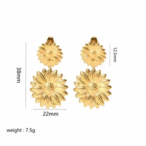 Detailed view of gold sunflower drop earrings with dimensions of 38mm length and 22mm width