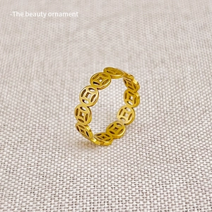 Golden Chinese copper coin ring featuring a hollowed 2025 zodiac snake design