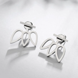 Detailed view of polished geometric floral stud earrings in high-grade stainless steel