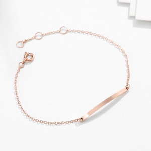 Gepolijste roségouden roestvrijstalen armband met een minimalistische rechthoekige plaat