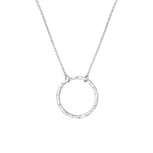 Minimalist silver stainless steel necklace featuring a handcrafted hammered circle pendant