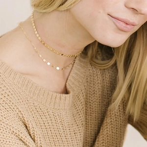Double layer 14K gold plated stainless steel chain necklace worn on model neck