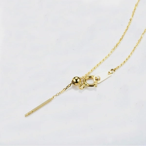 Detail of 14K gold plated adjustable chain with spring clasp and slider bead for DIY jewelry
