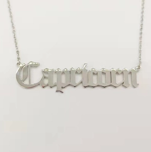 Silver Capricorn zodiac pendant necklace with gothic font on fine stainless steel chain
