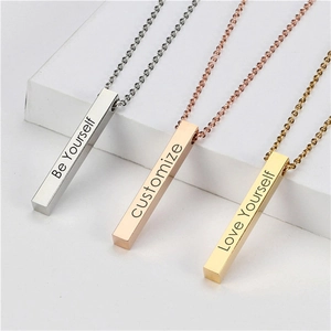 Polished 316L stainless steel bar necklaces in silver, gold, and rose gold with custom engraving