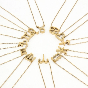 Lot de 12 colliers avec pendentifs des signes du zodiaque en acier inoxydable doré