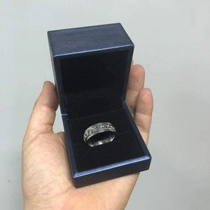 Silver chain textured ring for men presented in a premium blue velvet jewelry box