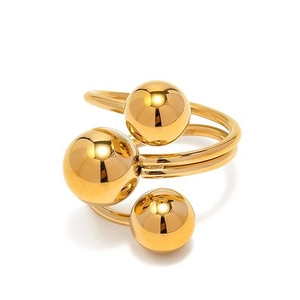 Minimalist gold-plated brass open ring with three polished spheres in a spiral design