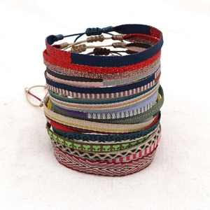Bohemian hand-woven friendship bracelet set with ethnic patterns and adjustable cord