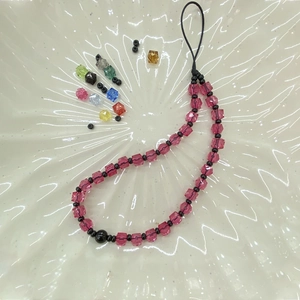 Pink acrylic cube beaded phone charm with geometric faceted beads and black cord