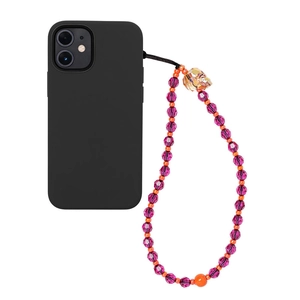 Detail view of purple crystal skull phone strap with vibrant acrylic beads and black case