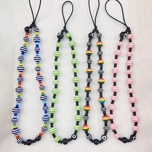 Lot de bijoux de téléphone ethniques avec perles rayées et pendentifs œil bleu