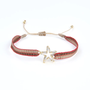 Bracelet tressé ethnique avec breloque étoile dorée et incrustation de zircones