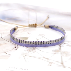 Bohemian purple and grey woven friendship bracelet with adjustable sliding knot closure
