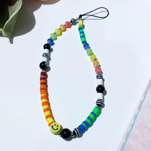 Rainbow beaded phone charm strap with colorful resin beads and a yellow smiley face icon
