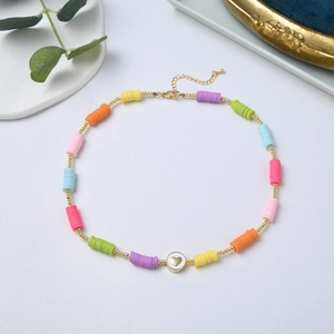 Rainbow heishi bead necklace with 18K gold-plated heart pendant and lobster clasp