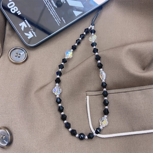 Luxe crystal beaded phone lanyard with black faceted beads and iridescent charms
