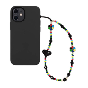 Colorful beaded phone strap with black heart pendant on a matte black smartphone case