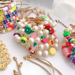 Colorful fruit clay and pearl charm bracelets with adjustable cord for summer vibes