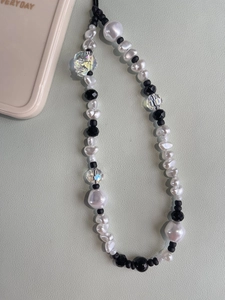 Baroque pearl phone charm strap with black beads and crystal glass in minimalist style
