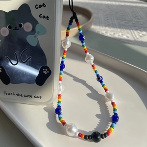 Rainbow beaded phone strap with colorful seed beads, faux pearls and evil eye charm