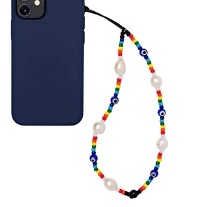 Rainbow bead phone strap with blue evil eye charm and baroque pearls on a phone