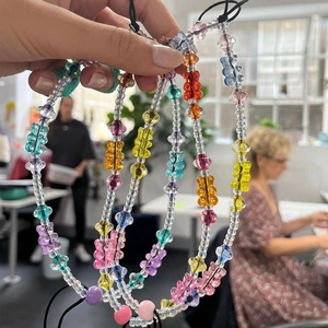 Colorful handmade gummy bear beaded phone charms set with transparent acrylic beads