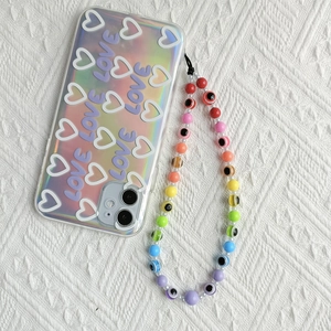 Close-up of rainbow gradient phone chain with heart pattern laser holographic phone case