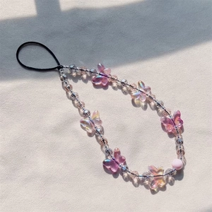 Elegant butterfly phone charm with gradient pink beads and stylish Y2K aesthetic lanyard