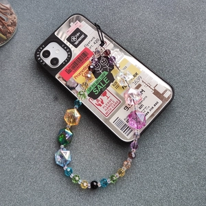 Detailed macro view of colorful faceted crystal beads on the anti-lost mobile phone lanyard