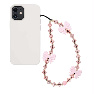 Pink beaded butterfly phone charm with lantern beads and gold accents on a white background