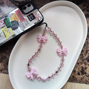 Handmade pink butterfly beaded phone strap with clear beads and silver accents