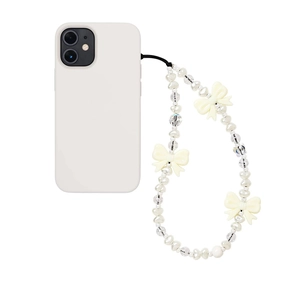 Dragonne de téléphone chic avec perles crème et nœuds papillon pour femmes