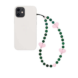 Handmade phone strap with black agate beads and pink heart charm on a white case