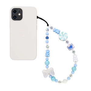 Handmade beaded phone wrist strap with blue resin bows, bears, and candies on white case