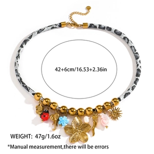 Bohemian multilayer necklace with colorful charms and grey leopard fabric details
