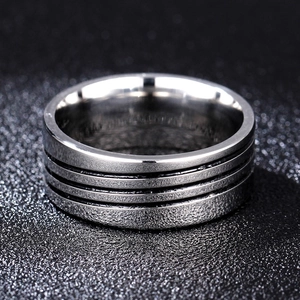Vintage stainless steel ring for men featuring triple black grooves and a matte finish