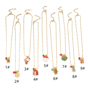 Detailed collection of nine gold stainless steel Christmas necklaces with colorful pendants