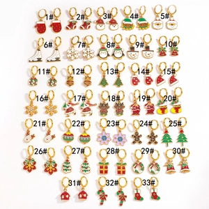 Collection of 33 Christmas dangle earrings featuring festive reindeer and snowflake designs