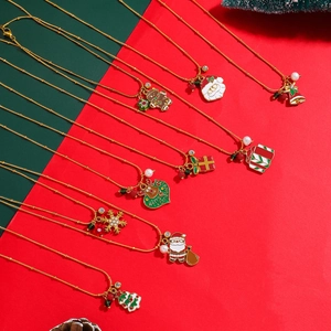 Golden Christmas necklace collection with reindeer, snowflake and bell pendants