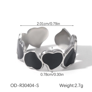 Macro view of open heart ring with black enamel drip oil and precise size measurements