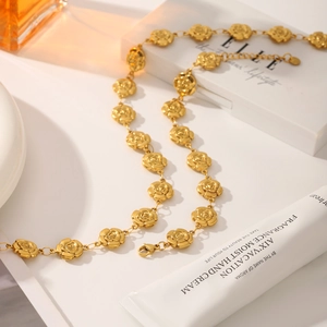 Elegant gold flower necklace with rose shaped charms and adjustable lobster clasp chain