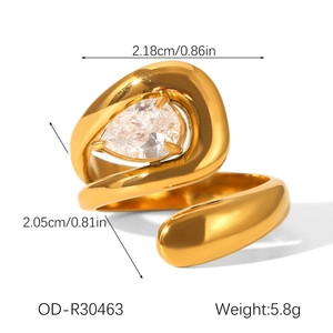 Detail of asymmetric gold ring featuring a teardrop zircon stone and weight of 5.8g