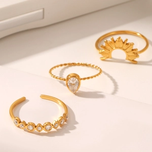 Three-piece gold plated stainless steel ring set with sparkling zirconia crystals