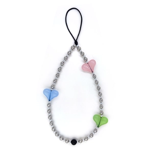 Handmade beaded phone strap with colorful heart charms and silver metallic beads on white background